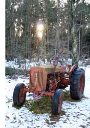 old tractor in the snow
