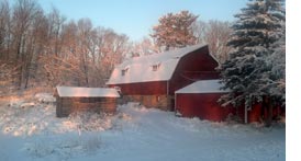 Ruesch farm buildings covered in snow