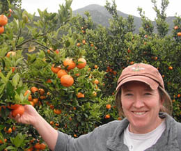 Emily Ayala of Friend's Ranches in the orchard