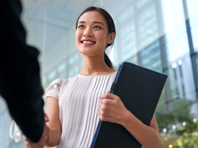2018-02-Worklife-woman-office-interview-handshake-informational-shutterstock_284904062-MAIN