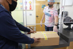 Project Open Hand workers preparing FoodWorks boxes for delivery to hungry neighbors in San Francisco,