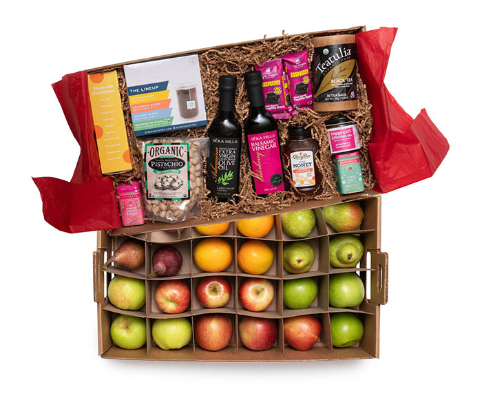 holiday gift basket with fruit, honey, olive oil, tea, coffee