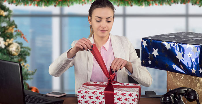 employee opening holiday gift