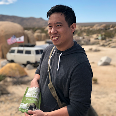 Man holding snack
