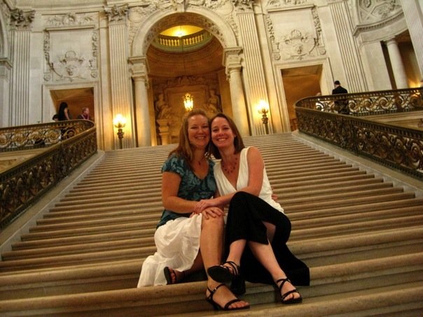 Two women on the steps of San Francisco City Hall