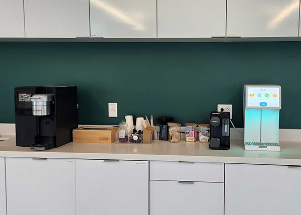 Office break room with a Keurig, Bevi machine, and drink add-ons