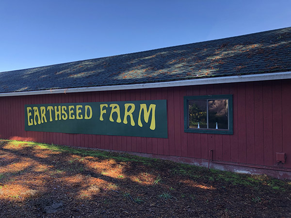 Barn with Earthseed Farm sign