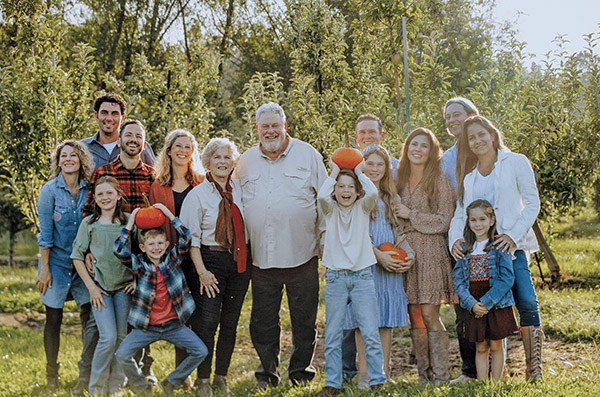 Happy family with pumpkins