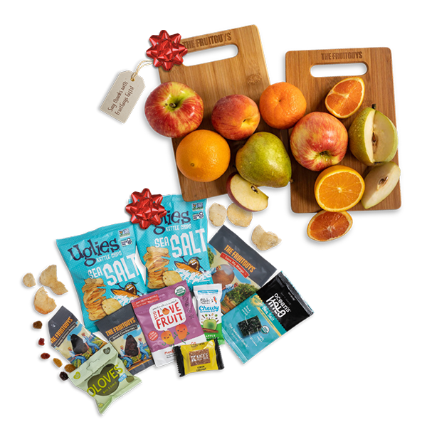 Variety of fruit and snacks with bows and note