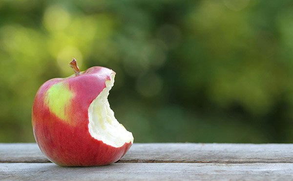 Apple with a bite taken out