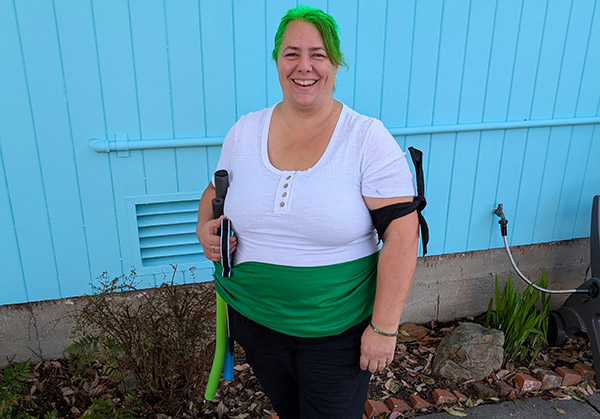 Smiling woman in Zoro Halloween costume