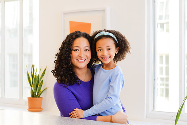 Smiling mother and daughter