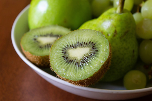 kiwi fruit in a bowl with other fruits