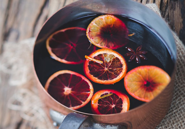 Pot of wassail with oranges and star anise floating in it