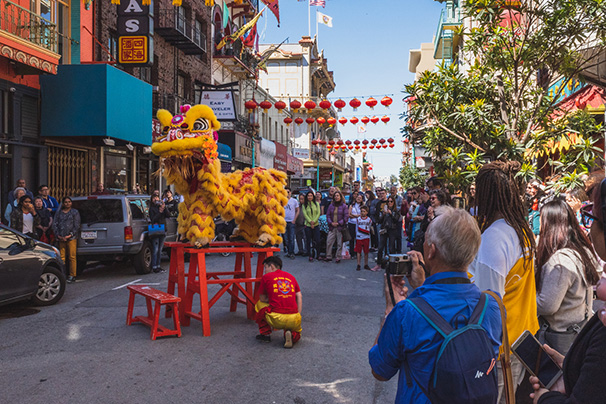 Crowd surrounding Lion Dance dragon at Lunar New Year celebration