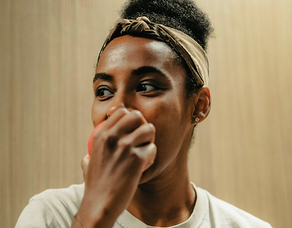 Woman eating apple