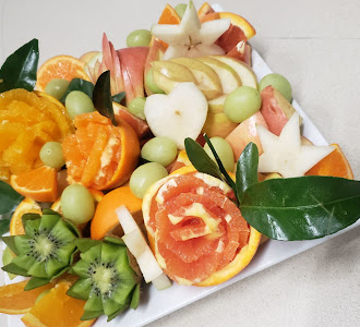 Fruit platter with citrus roses