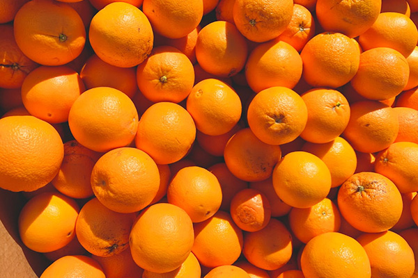 overhead view of large number of citrus fruits