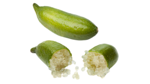 Finger limes, one whole and one split in half with pearls spilling out