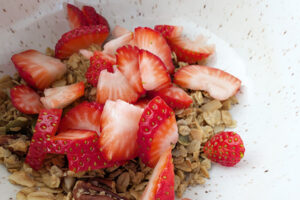 Bowl of granola and strawberries