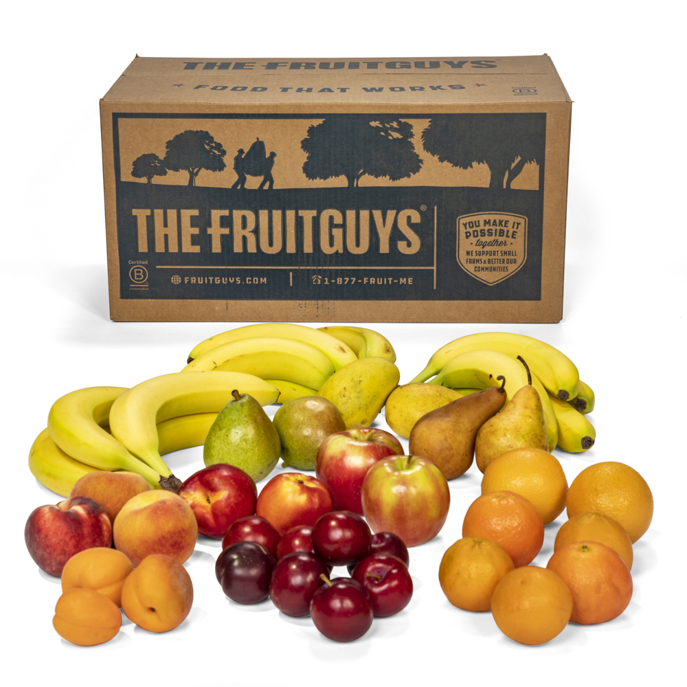 The FruitGuys box surrounded by fresh fruit