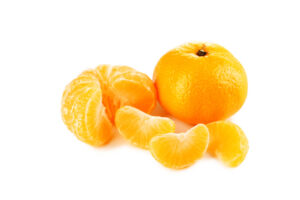 Kishu mandarin, one whole and one peeled and partly segmented