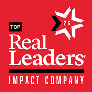 Real Leaders '26 Top Impact Company Badge