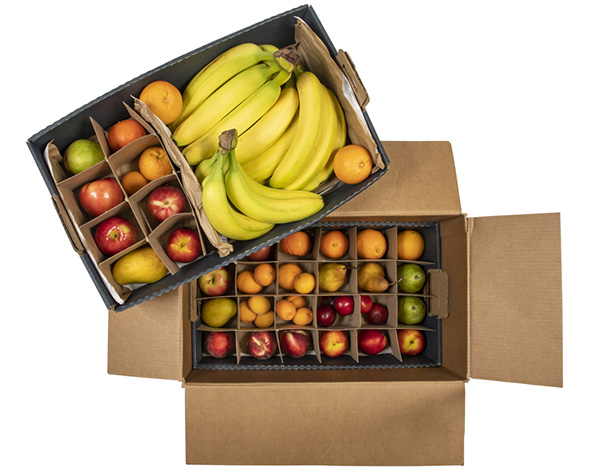Box of fresh fruit, two trays stacked on top of each other