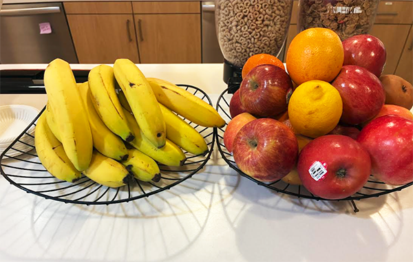 Bowls of fresh fruit in the office break room