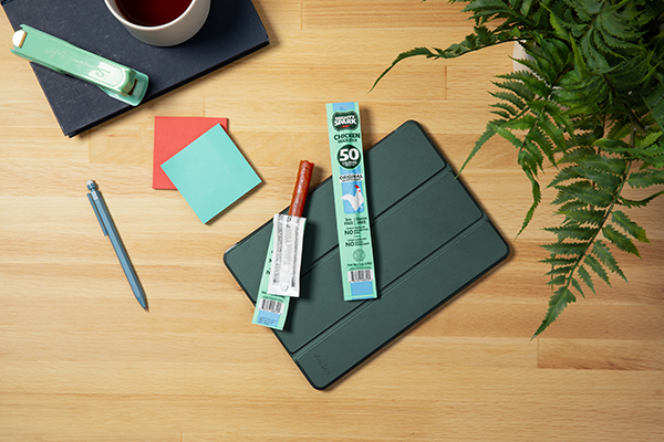 Chicken snack sticks on an office desk