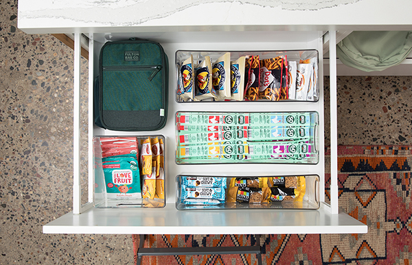 Mighty Spark chicken snack sticks in a drawer with other office snacks
