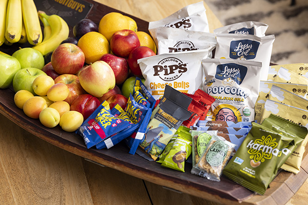 fresh fruit and snacks in a large shallow bowl