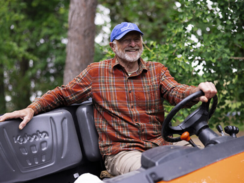 Smiling farmer on tractor