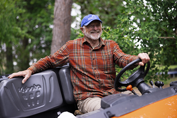 Smiling farmer on tractor