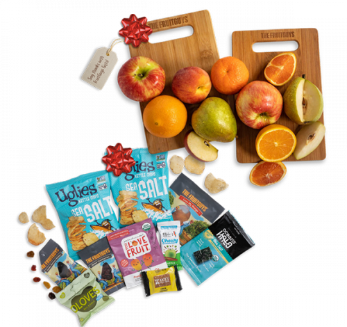 Variety of fruit and snacks with bows and note